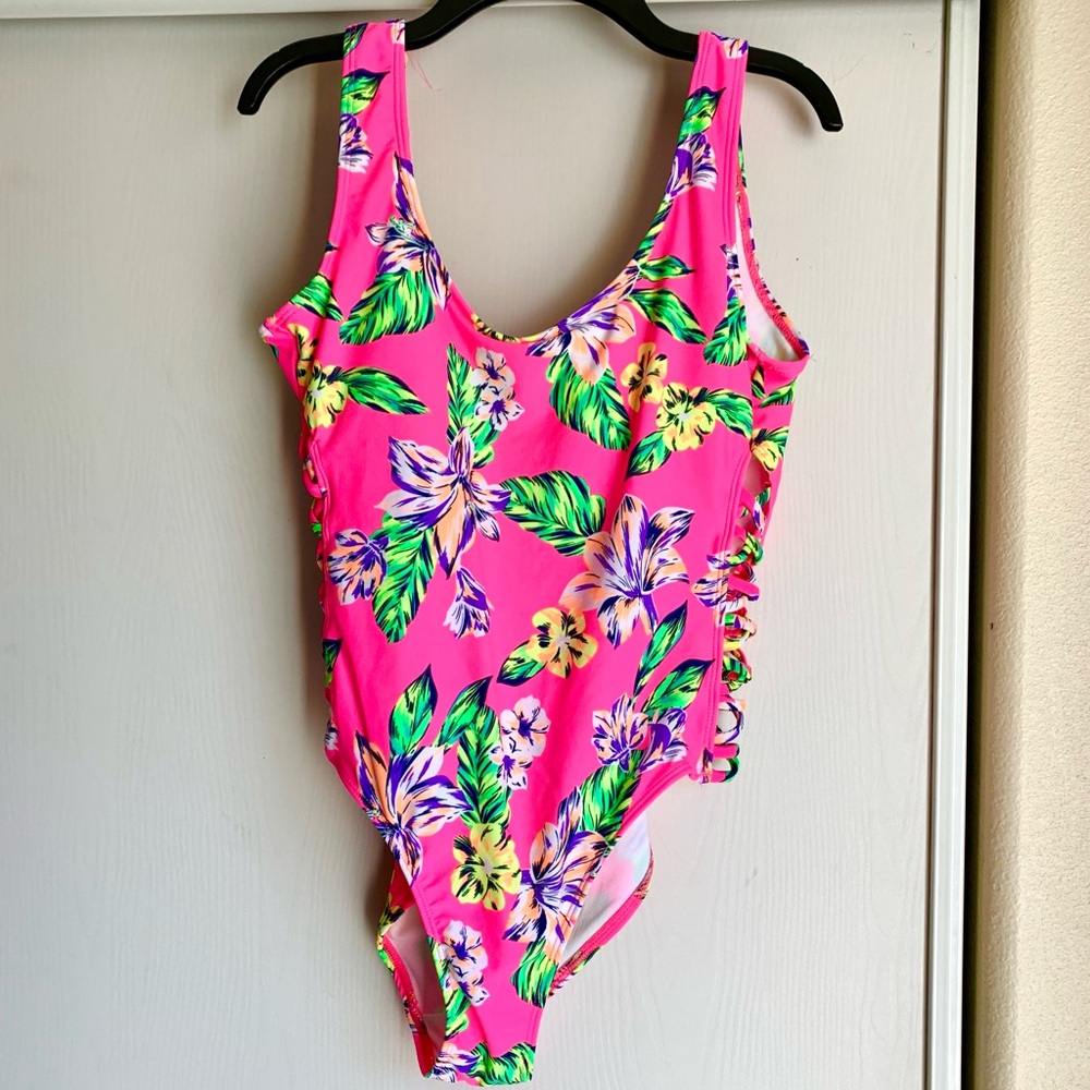 Sexy vibrant glowing cut-out one-piece